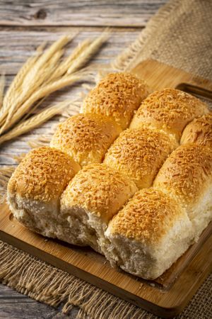 Coconut bread on the wooden table.