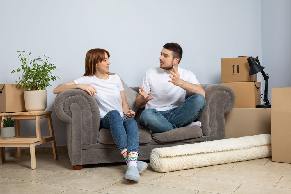 Concept of move with a happy young couple