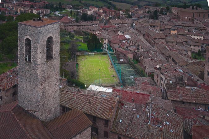 Aged city with football field