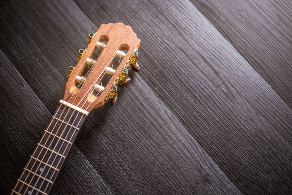 Ukulele on wooden tabletop