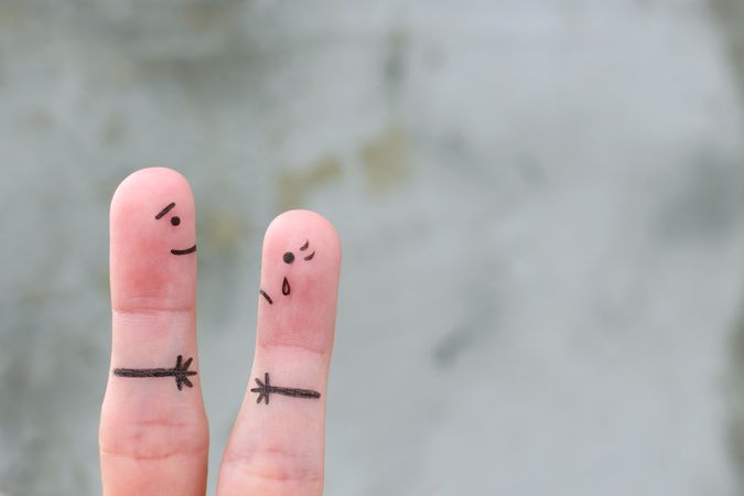 Fingers art of couple met after a long separation.