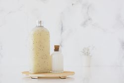 Bath products on wooden support with copy space