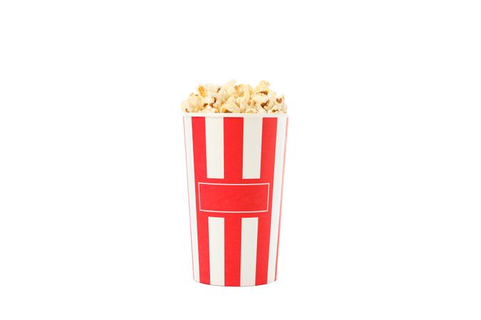 Striped bucket with popcorn isolated on plain background
