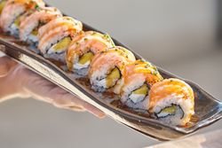 Appetizing Philadelphia maki rolls on tray