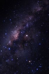 Milky way galaxy with stars and space dust in the universe, Long exposure photograph, with grain.