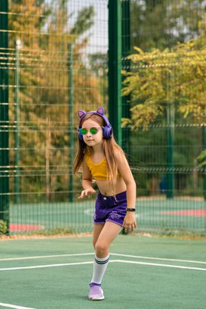 Playing on sports ground