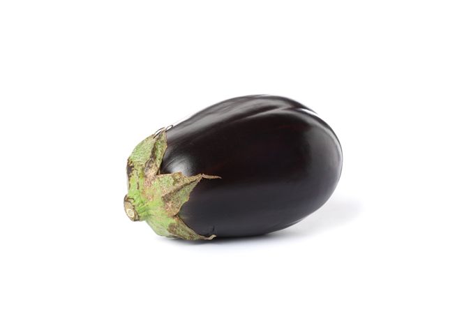 Fresh ripe eggplant isolated on plain background