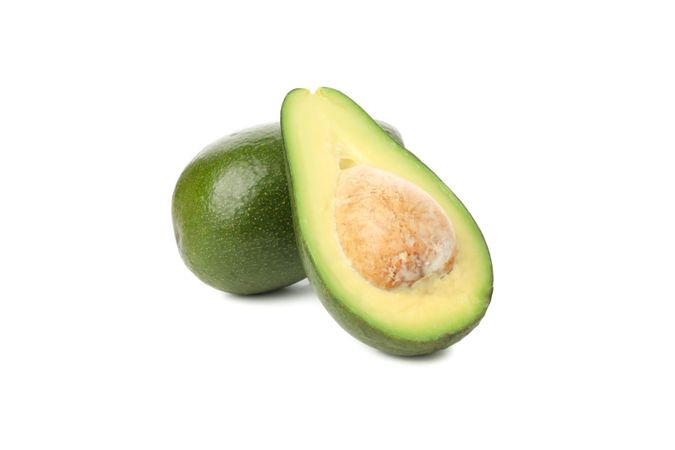 Ripe fresh avocado isolated on plain background