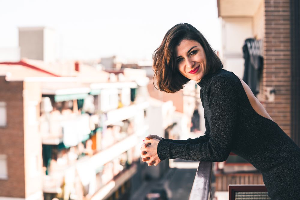 elegant woman on balcony