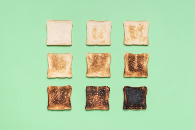 Toast bread variety top view on a green table