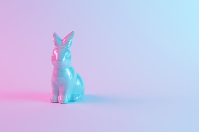Plastic Easter bunny with colorful ultraviolet holographic neon lights
