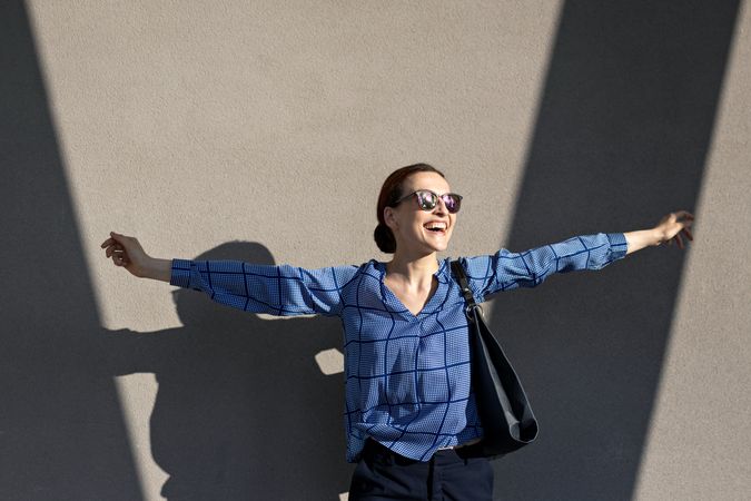 Excited businesswoman jumping