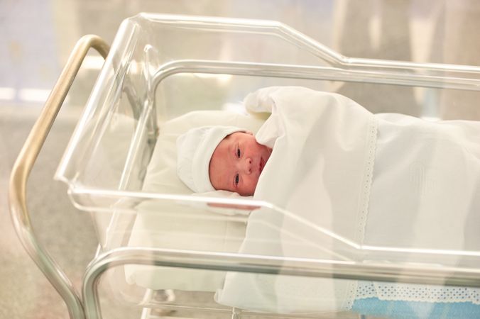 Newborn baby in a hospital recovery room