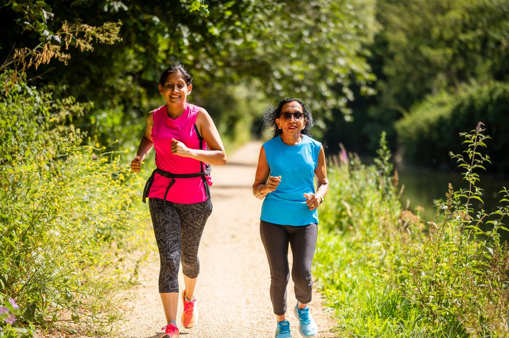 Sikh women jogging in park