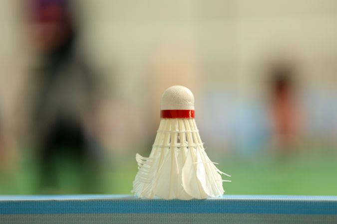 Badminton Shuttelcock with Court Background