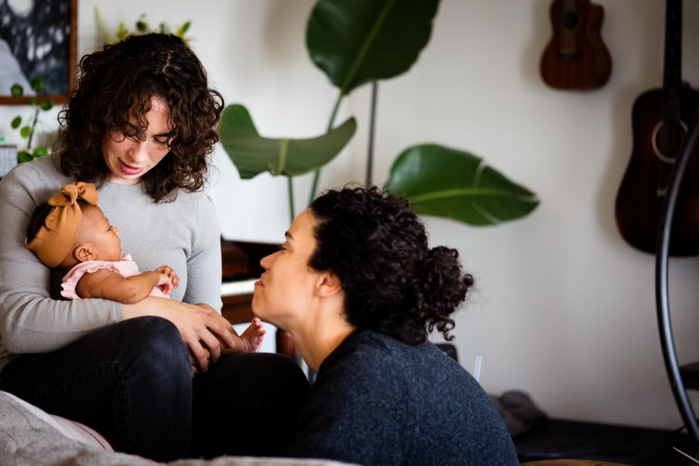 Two new moms at home with newborn