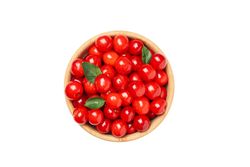 Bowl with fresh red cherry isolated on blank background