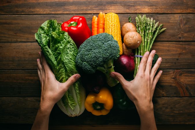 Vegetables and utensils on kitchen table