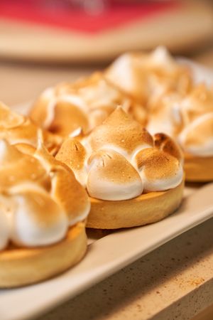 Delicious homemade tartlets on table