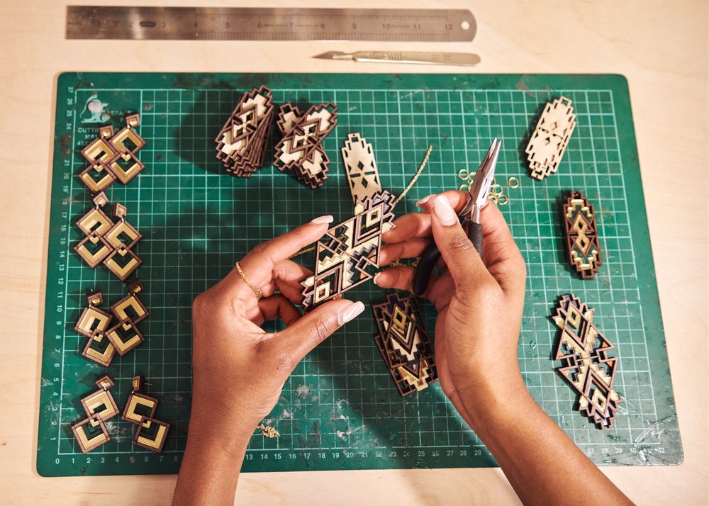 Close up of Black jewelry designer at work