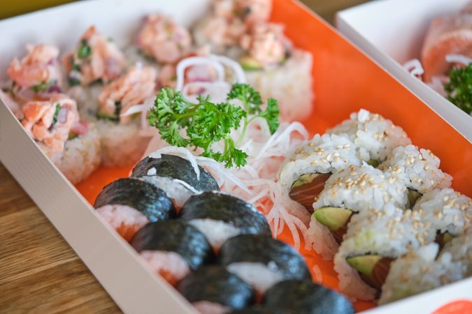 Assorted sushi rolls in box