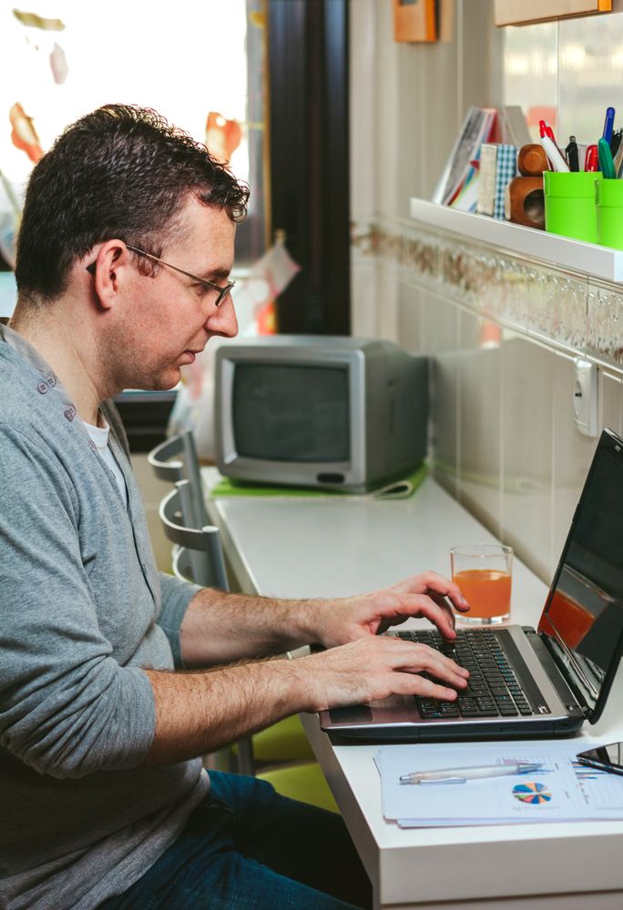 Man working from home with laptop