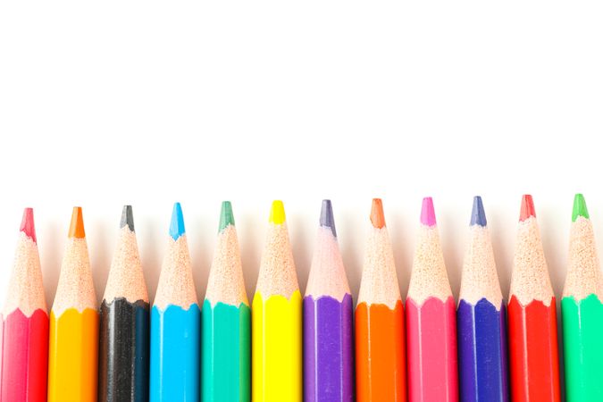 Many color pencils isolated on studio background