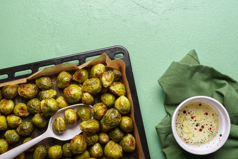 Roasted Brussels sprouts with olive oil mix on the side