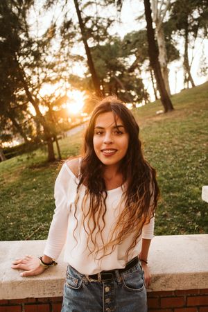 Cheerful young woman in street