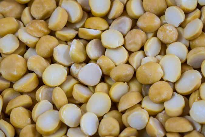 A background full of yellow Split Chickpeas also called Chana Dal or Split Bengal Gram