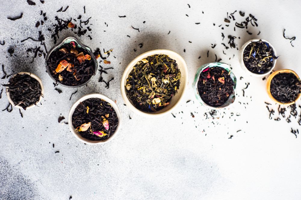 Top view of bowls of loose leaf tea