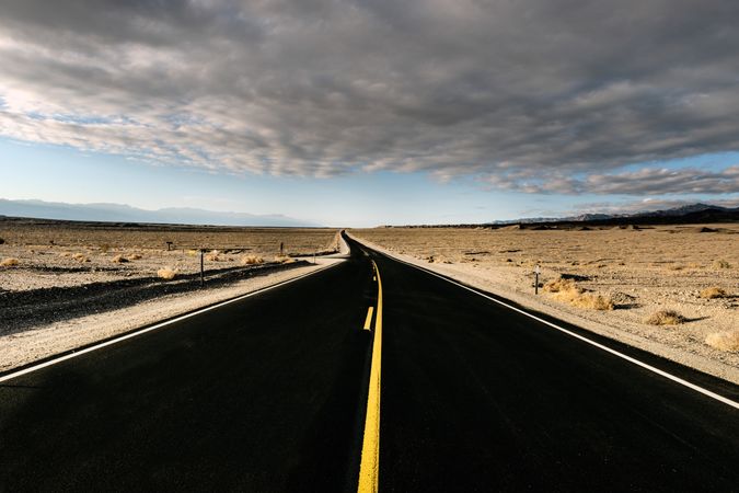 Desert highway meandering through Death Valley