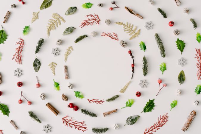 Rings of circles made of festive branches, pine cones and leaves