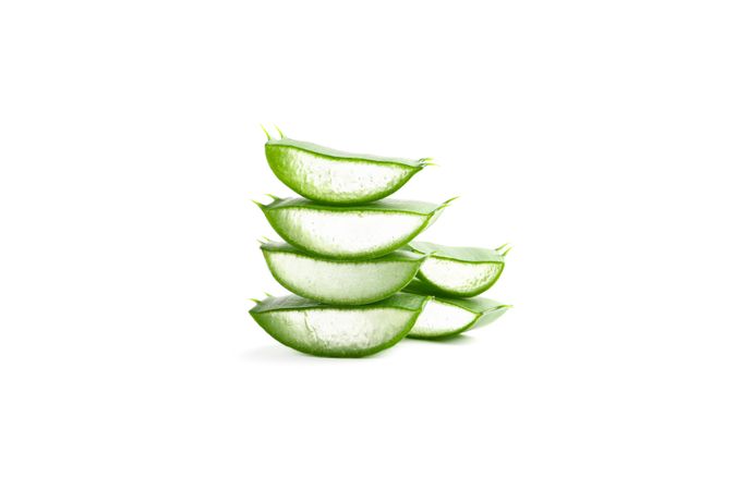 Aloe vera slices isolated on studio background. Herbal medicine