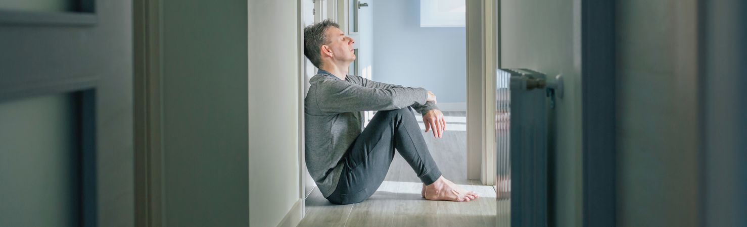 Man sitting on the floor