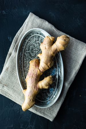 Raw ginger on plate