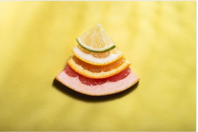 Stack of a mix of citrus fruits
