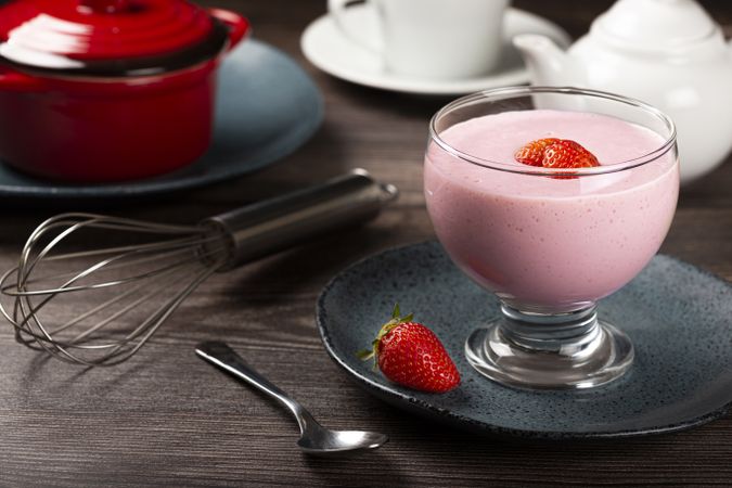 Delicious strawberry mousse in glass goblet.