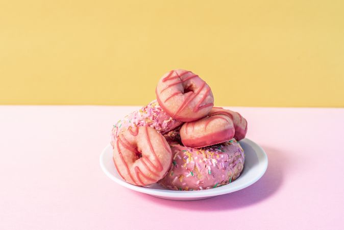 Pink doughnuts in a colorful background