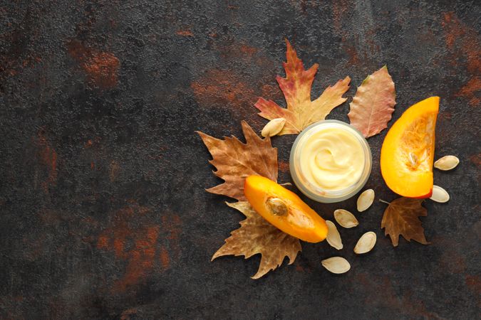 Concept of different cosmetic products, Pumpkin cosmetics, space for text
