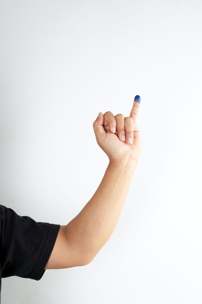 Mand Hand with Voting Ink Mark, Pemilu Indonesia