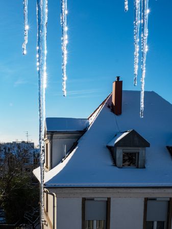 Icicles hang from the roof. Thaw. Spring
