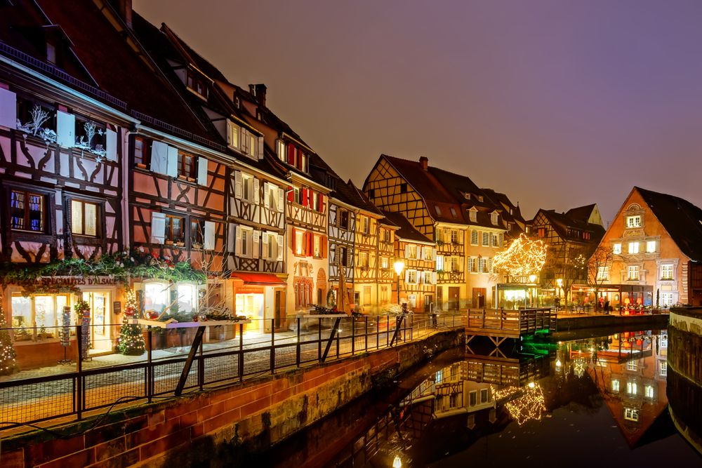Charming street at Christmas time in Colmar, Alsace, France