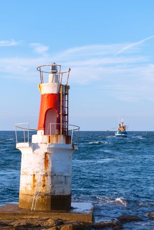 Lighthouse on rocky coastline