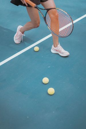 Cropped image of woman playing tennis