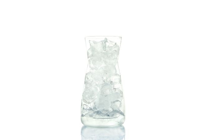 Glass carafe full of ice