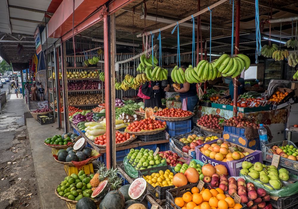 Boxes and baskets of fruits and vegetables at the market