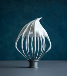 Whisk with buttercream contrast