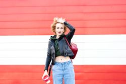 Curly female hipster outdoors