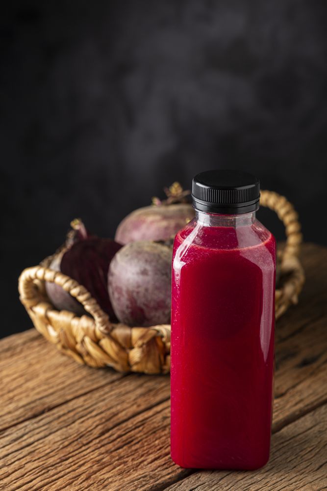 Red beet juice in plastic bottle.